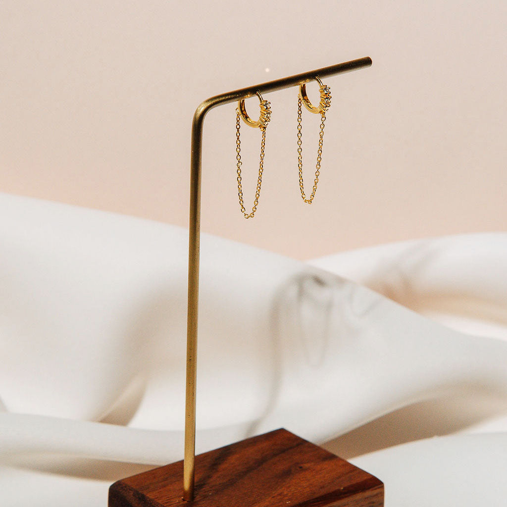 Emilia earrings gold with detailed crystal stones gold chain