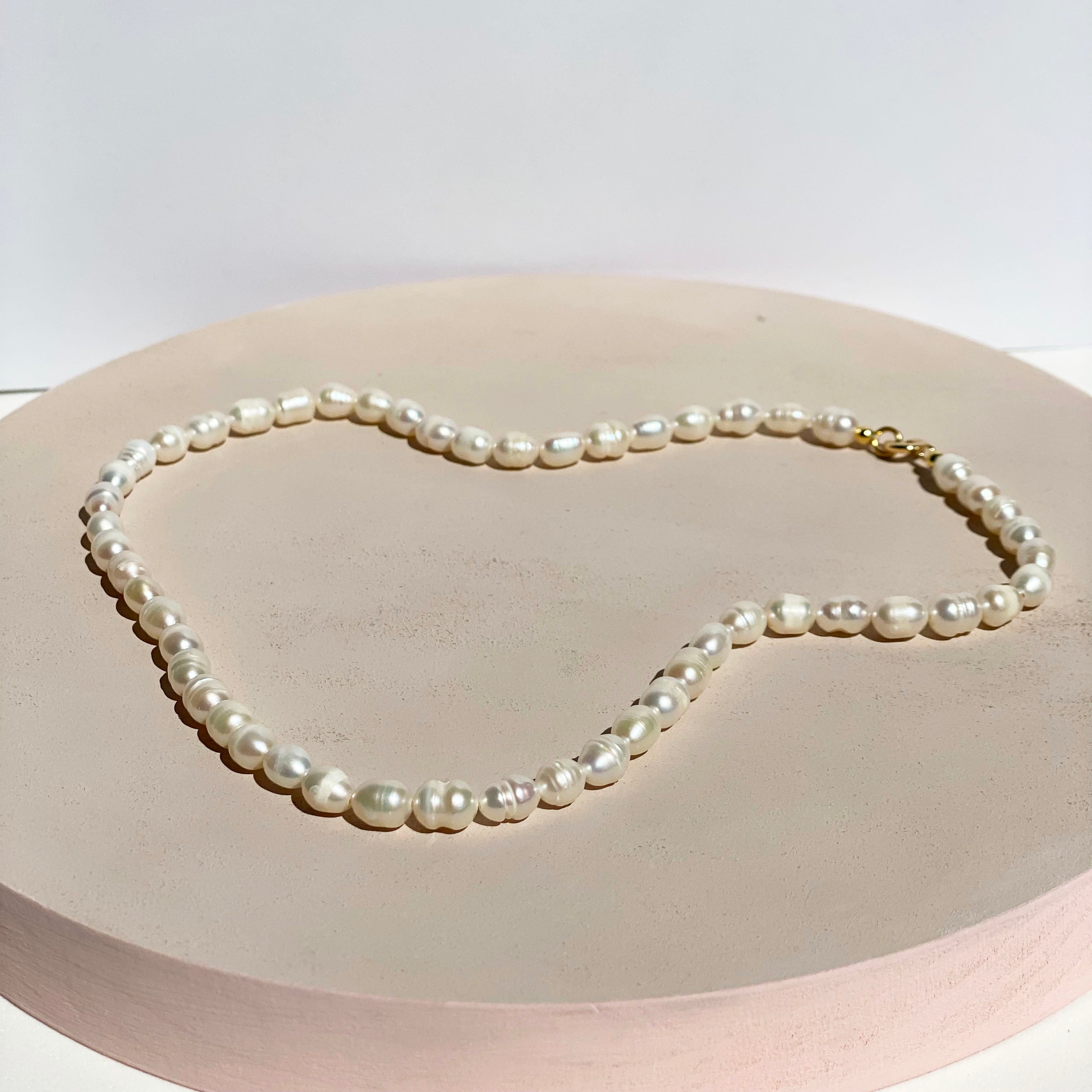 freshwater pearl necklace in 18k gold