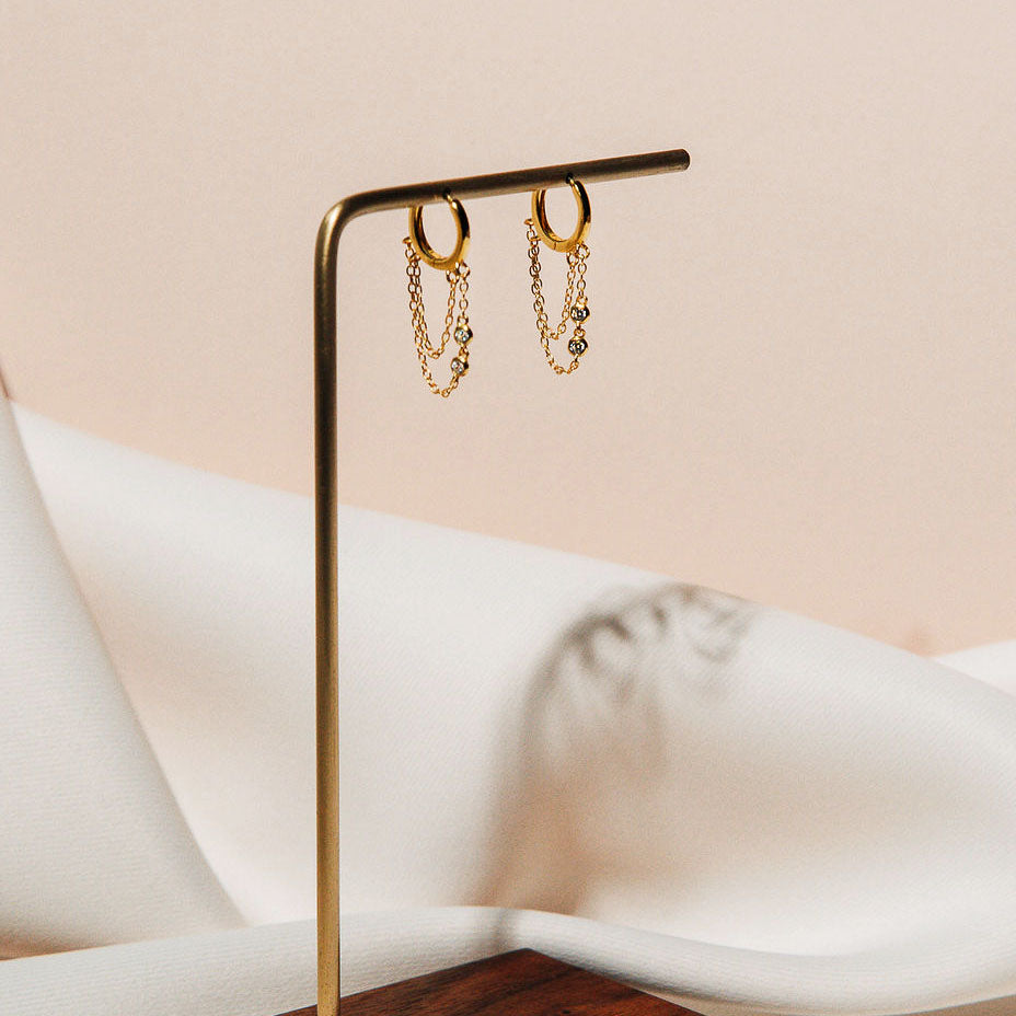 double diamond drape chain gold earrings